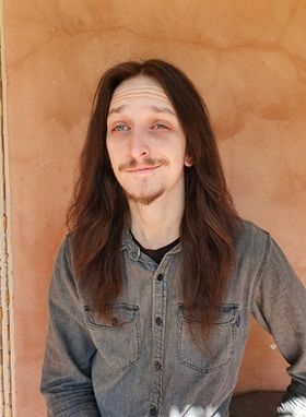 Dylan Warren with quirky expression